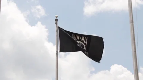 POW Flag Blowing in the Wind - Slow motion Stock Footage 83058328