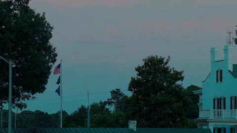 POW MIA Flag Pole Dusk American State Flags Magnolia Tree Southern Town in Stock-Footage 346427944