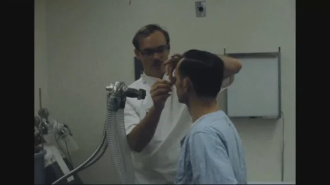 POW serviceman tests breathing function at David Grant Medical Center - 1973 Video stock 99916836