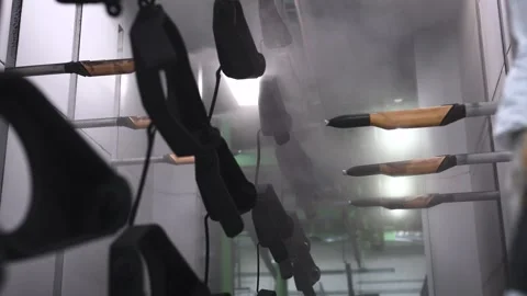 Powder coating shop at a machine-building enterprise. Automatic painting of Stock Footage 243565549