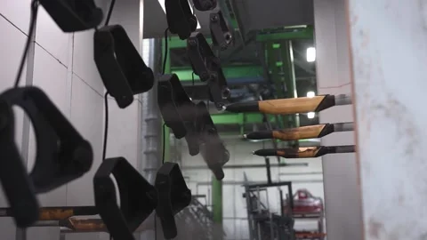Powder coating shop at a machine-building enterprise. Automatic painting of Stock Footage 244213559