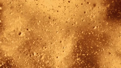 Powder exploding gold 4k Stock Footage 229428929