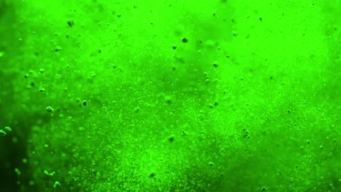 Powder particles exploded green Stock Footage 229458639