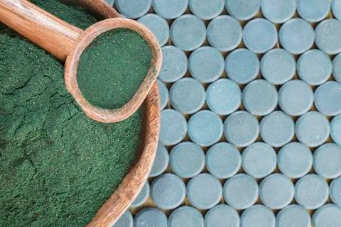 Powder, tablets and infusion of spirulina Stock Photos