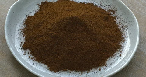 Powdered chaga on a plate. Video stock 277538478