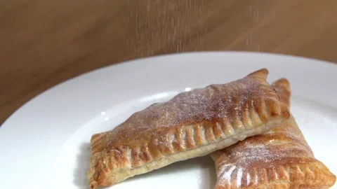 Powdered sugar on an apple pie Stock Footage 135714734