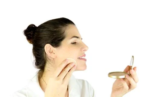 Powdering her face Stock Photos