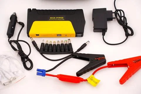 Power bank with the function of starting car on a white background. jump st.. Stock Photos