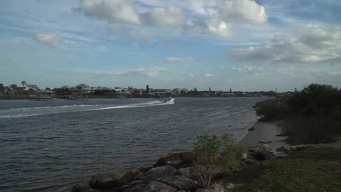 Power boat speeding down the Intercoastal Waterway Stock Footage 147502381