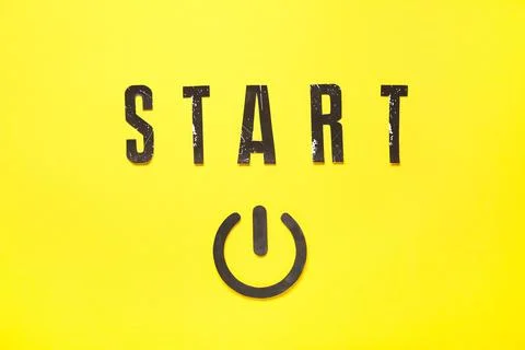 Power button and word START on yellow background Stock Photos