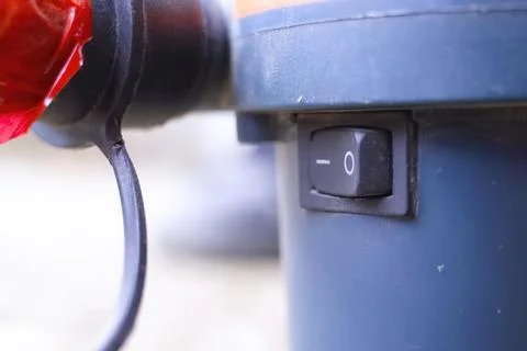 Power button of an angle grinder electric supply of grinding tool Stock Photos