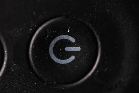 Power on/off Button on black Stock Photos