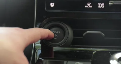 Power button of a car pushed for turning off Stock Footage 327687845