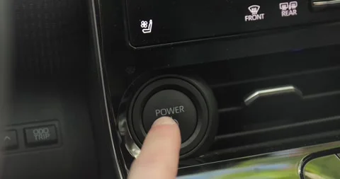 Power button of a car pushed for turning off Stock Footage 327725716