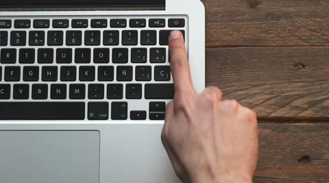 Power on button macbook Stock Footage 63375913