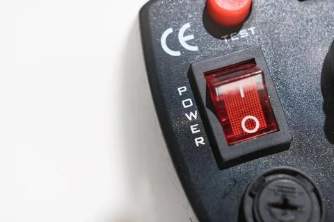 Power button on the Studio flash on a white background. Fotos Stock