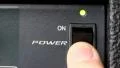 Power button turn on/off; powered audio mixer HD Footage