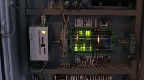 Power cable connected to a circuit breaker in the electrical cabinet Stock Footage