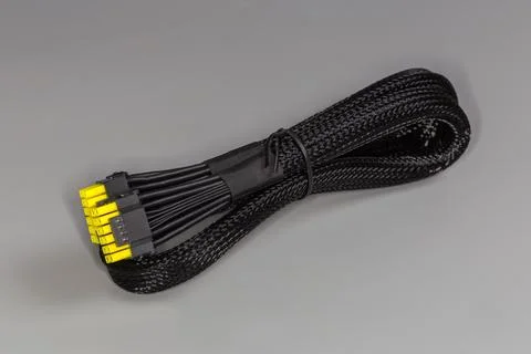 Power cable of modular computer power supply in braided sleeving Foto stock