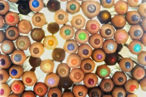 Power of creativity. stack of random color pencils with backlit light from be Stock Photos