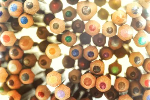 Power of creativity. stack of random color pencils with backlit light from be Stock Photos