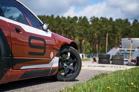 Power drifting car from side. Front door Stock-Fotos