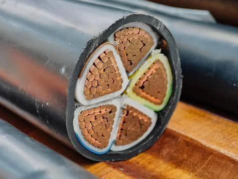 Power electric cable cross section revealing intricate design and structure Stock Photos