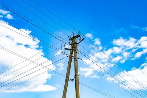 Power electric pole with line wire on colored background close up Stock Photos