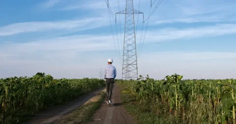 Power engineer rides an electric kick scooter. Stock Footage 141250705