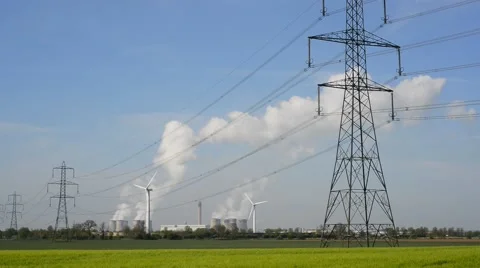 Power generating windmills and drax power station uk Stock Footage 49845923