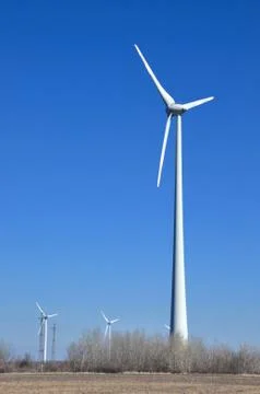 Power generating windmills Stock Photos