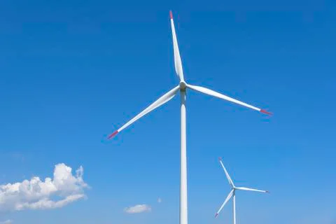 Power generation wind turbines. Stock Photos