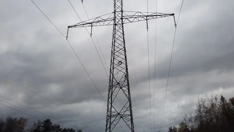 Power grid electric line pole on the cloudy sky background 動画素材 119786284