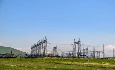 Power grid infrastructure under bright sun 写真素材