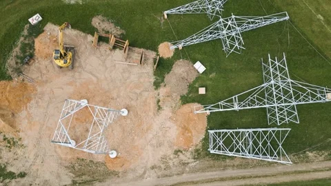 Power grid line electricity construction site drone aerial shot Stock Footage 276434990
