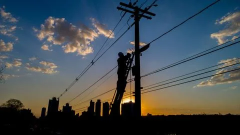 Power grid technician doing maintenance Stock Photos