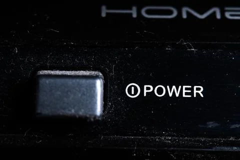 Power icon and button close up of a old DVD player Stock Photos