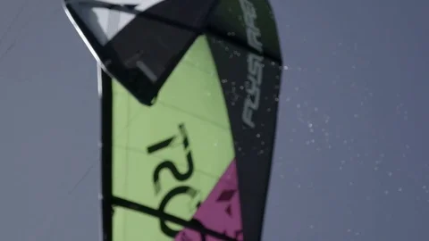 Power kite flying in the blue sky Stock Footage 74908231