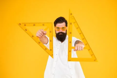 Power knowledge. Bearded nerd triangle. Smart student. Geometry teacher. Student 写真素材