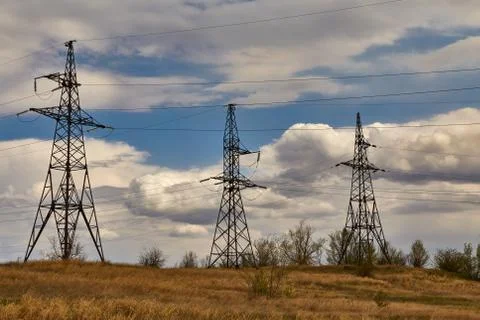 Power line and clouds Stock Photos