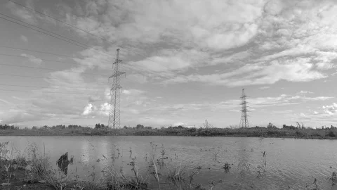 Power line and clouds in summer black and white timelapse Stock Footage 82987474