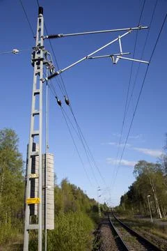 Power line and pylon structure at Finnish railways for electric trains , Finland Stock Photos