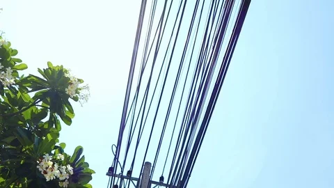 Power line on electric pole, highly dangerous under blue sky Stock Footage 117941210