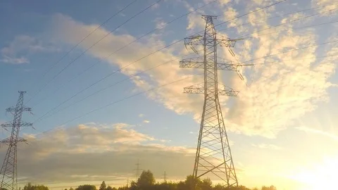 Power line in field at sunset timelapse 스톡 동영상 81606122