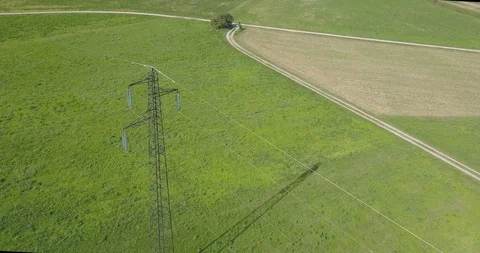 Power Line High Voltage Meadow Stock Footage 120116458
