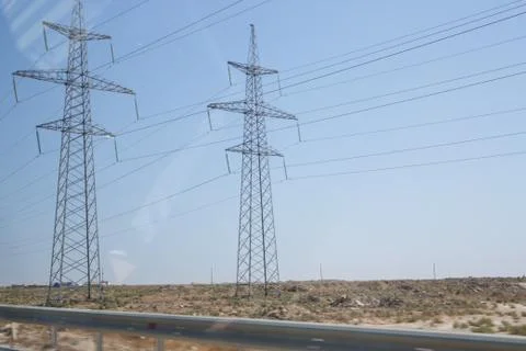 Power line high voltage post with blue sky background . Electricity pylon on  Stock Photos