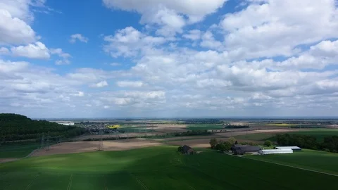 A power line passes through a rural area. Stock Footage 89704930