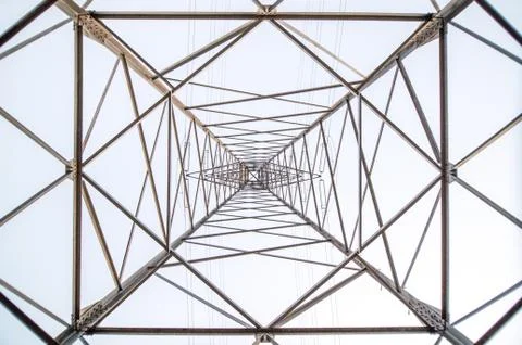 Power line pole seen from the base Stock Photos
