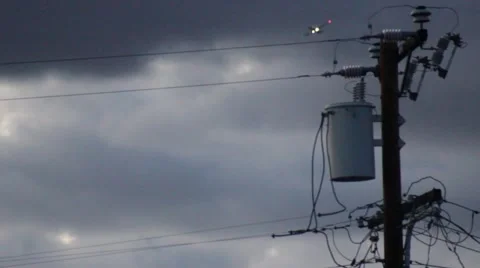 Power line pole transformer with plane Stock Footage 47522433