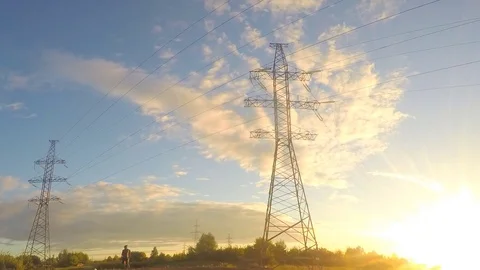 Power line at summer sunset timelapse Vídeo Stock 81600542